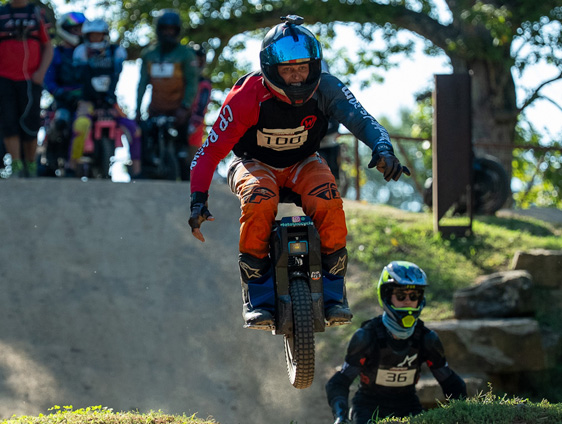 EUC rider mid-air on the race circuit